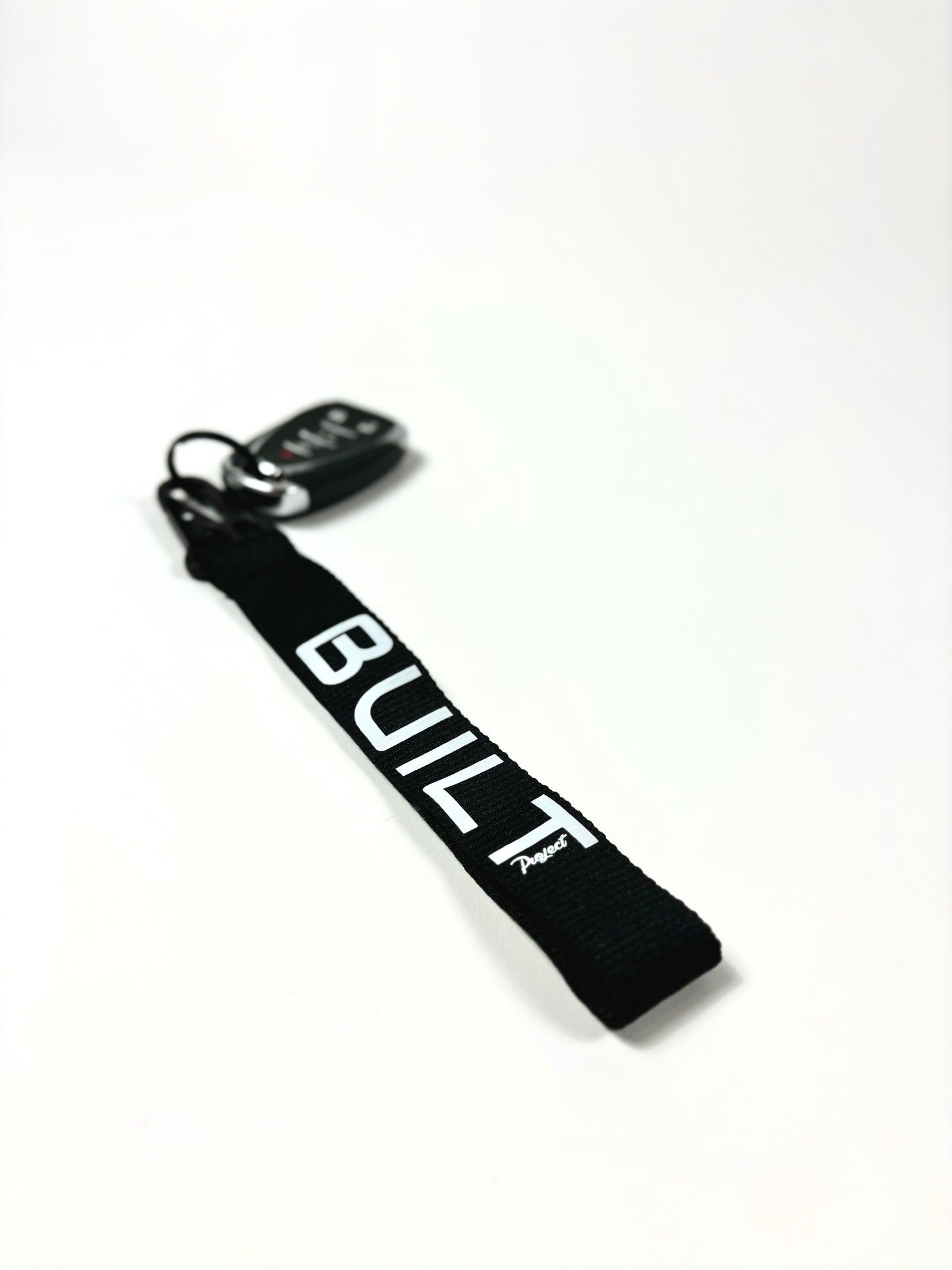 "Built" HD Keychains - Black or Red